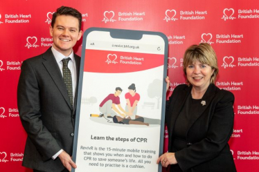 Maria Caulfield, MP for Lewes, joins The British Heart Foundation in Parliament to learn CPR with RevivR